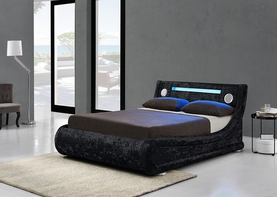 A curva estofada de couro preta do rei Size Storage Bed dá forma com luz do diodo emissor de luz